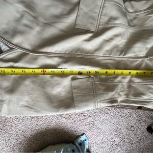 Alexies- leather strapless vest like top.